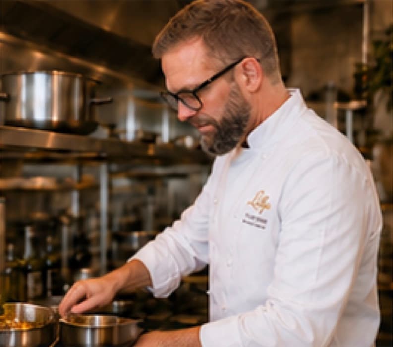 Tyler Gibson cooking in the Lillys kitchen